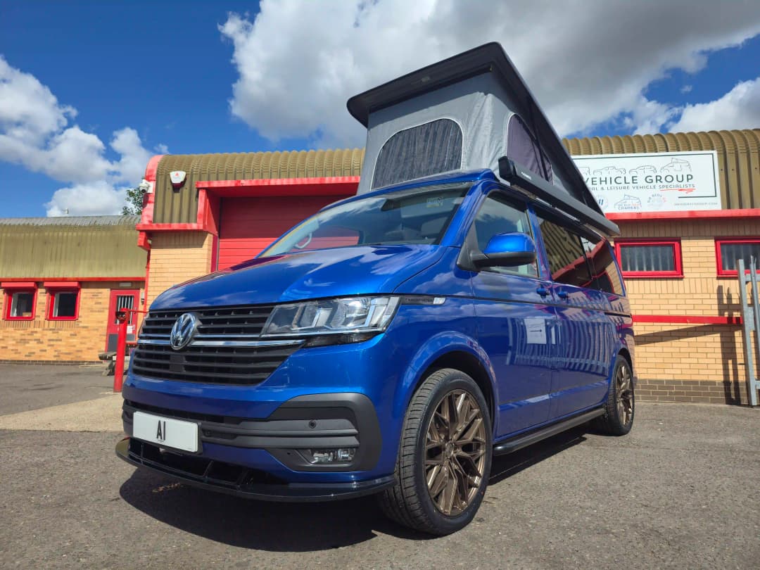 A blue VW campervan
